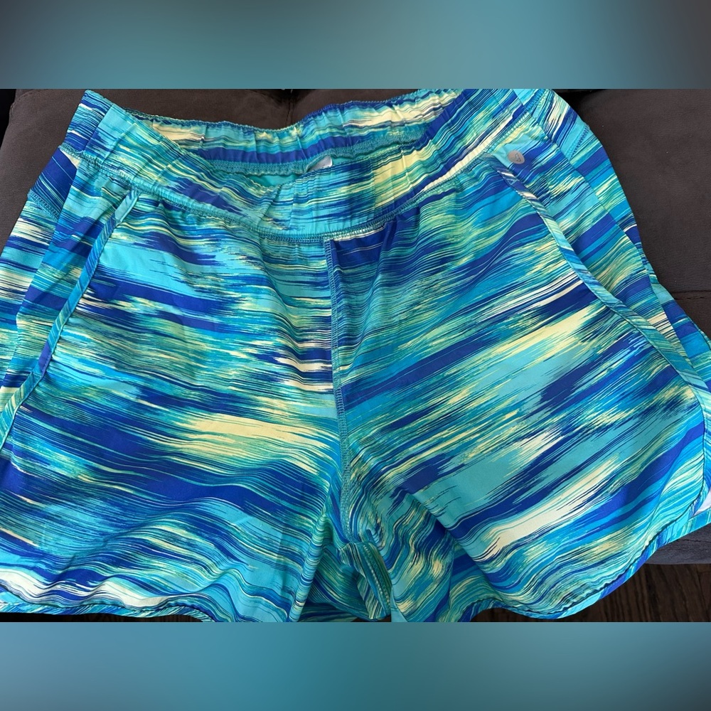 Livi workout shorts.  Blue yellow and green shorts. Women's size 14/16